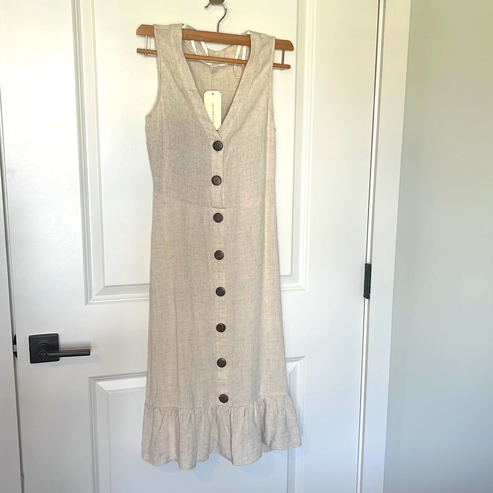Long maxi ruffled bottom down tan dress new with tags !!!